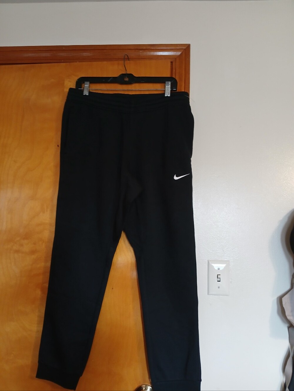 Nike Black Jogger Pants with White Swoosh